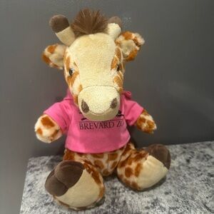 Giraffe Plush Toy From Brevard Zoo FL Wearing Shirt Stuffed AnimalPink and Brown